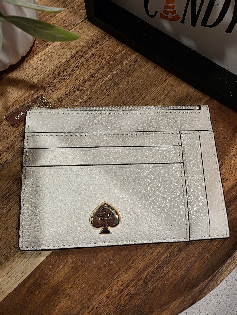 kate spade Cream Pebbled Leather Zip Card Wallet with Gold Spade Logo